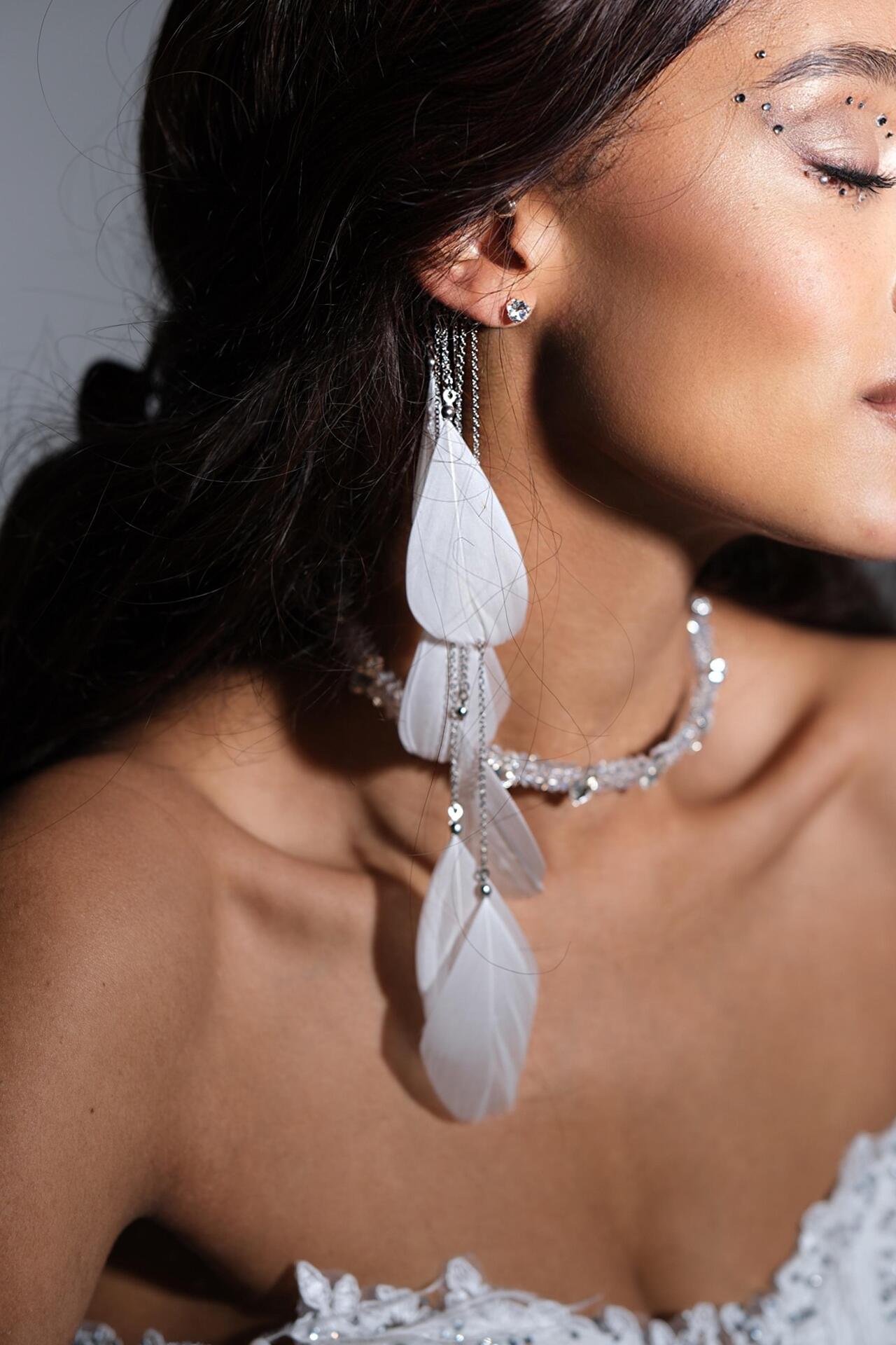 White feather ear accessory: Whisper Wing