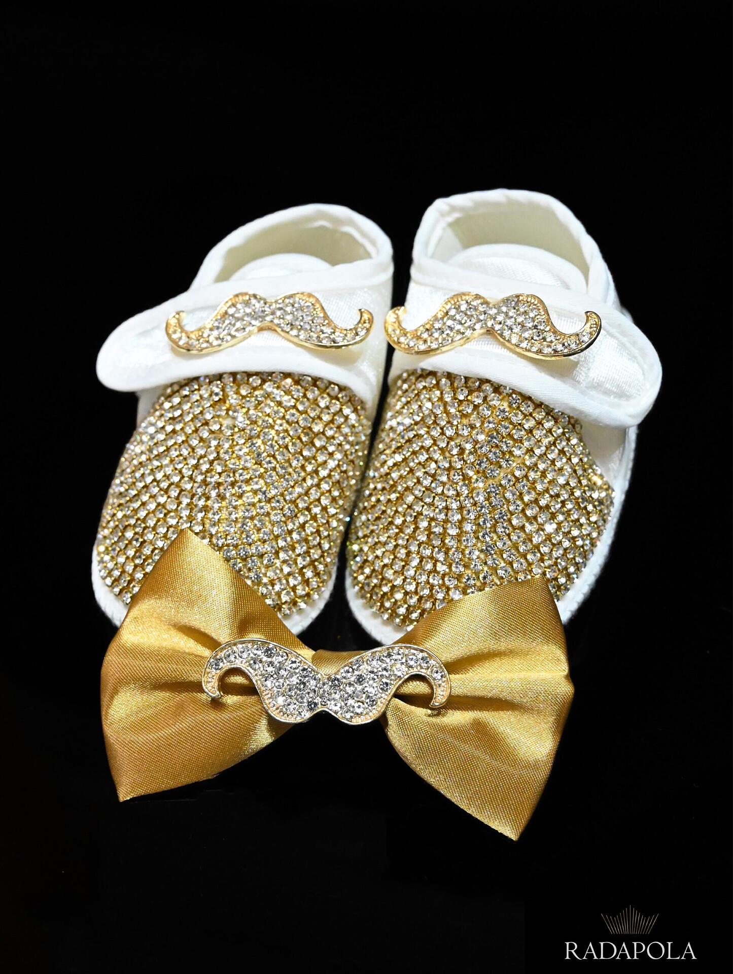 Baby shoes set with bow tie in gold