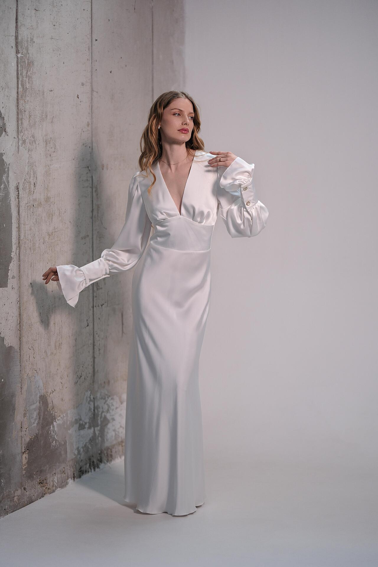 Elegant minimalist dress in white: Unéa