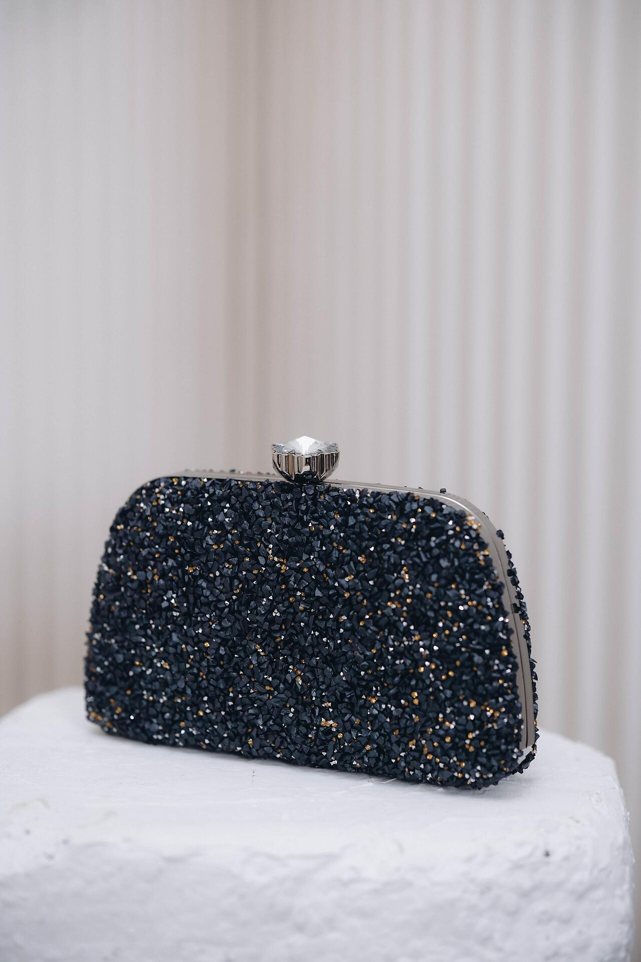 Clutch bag in black: Malora