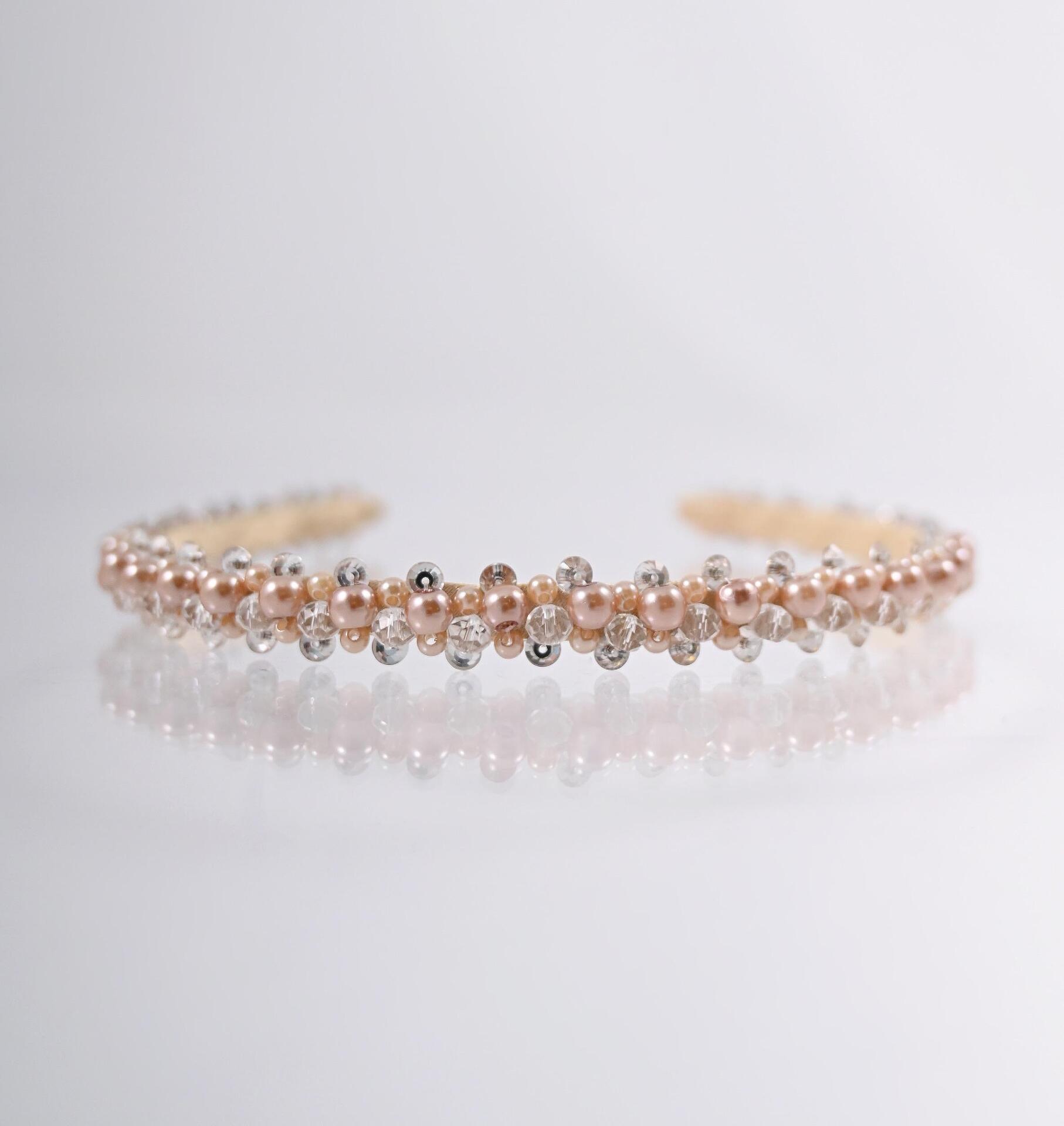 Delicate body-colored tiara