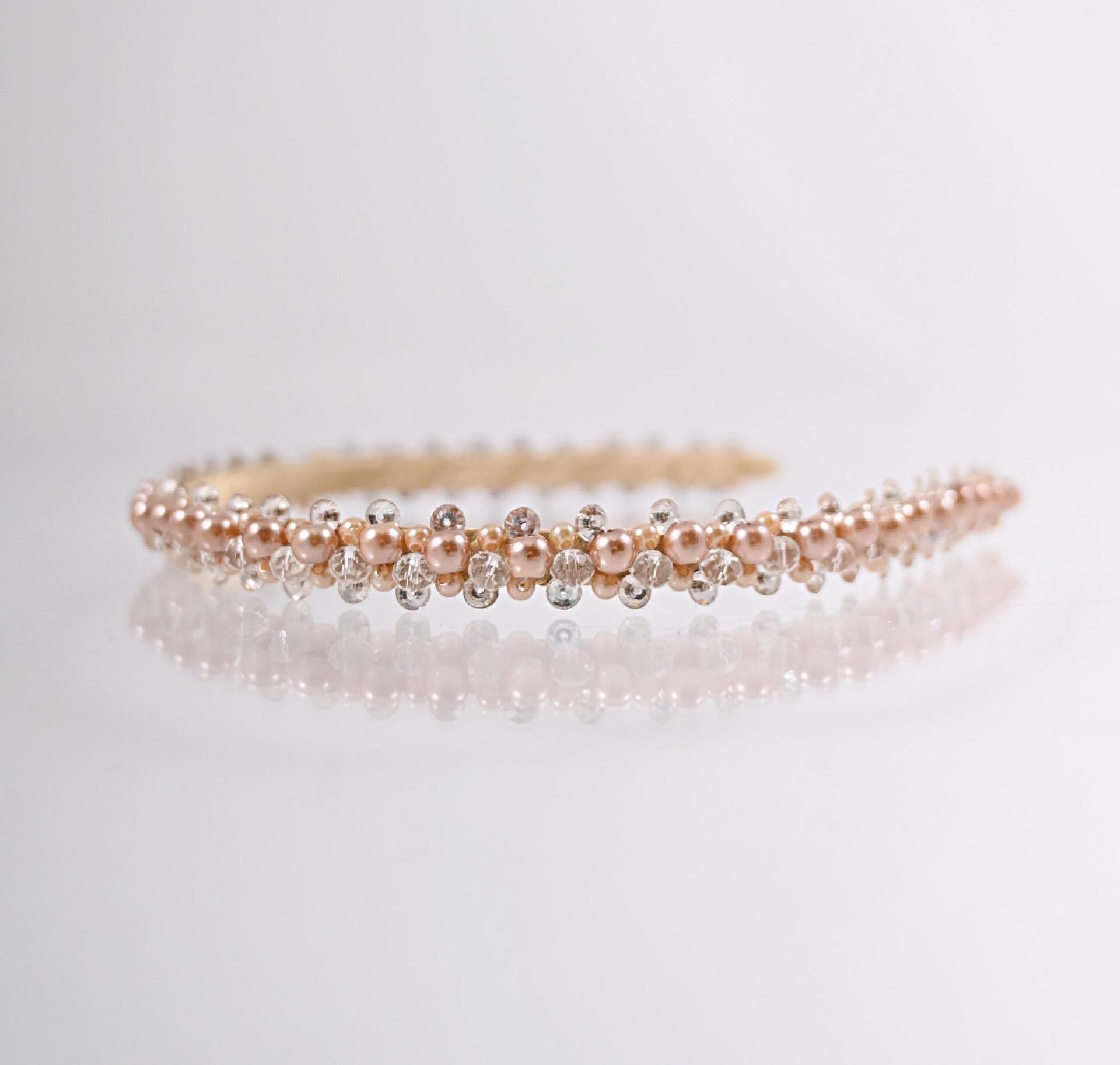 Delicate body-colored tiara