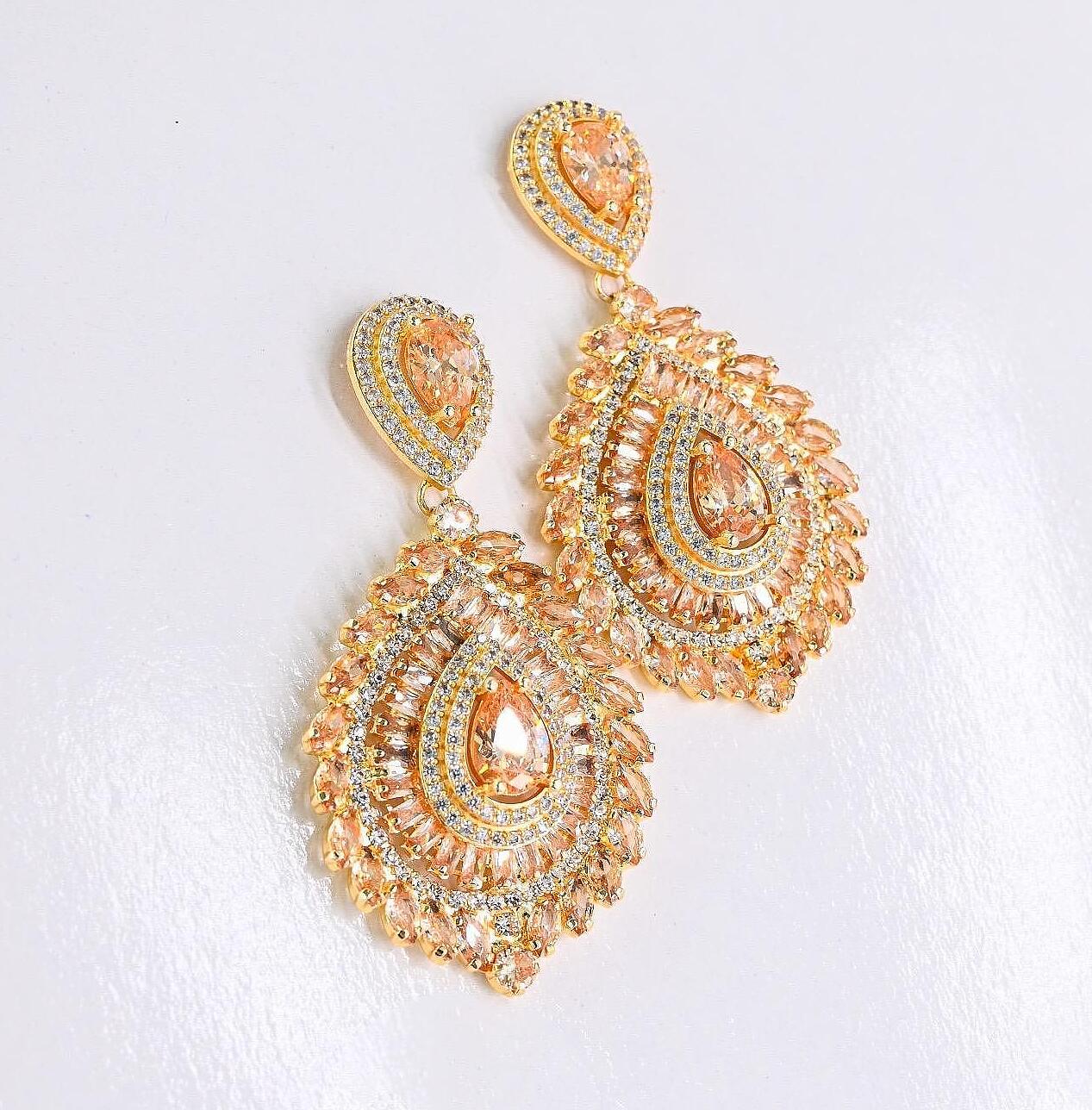 Earrings: Volume Gold Zirconium Earrings