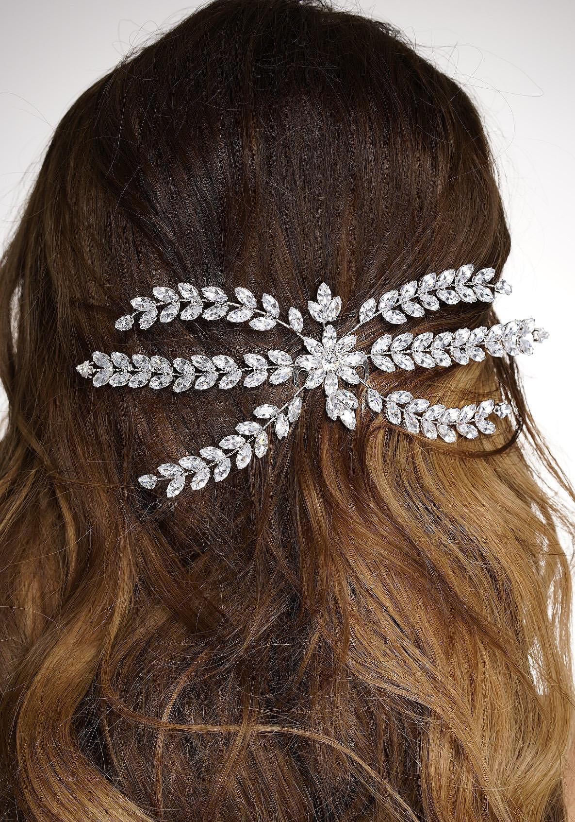 Brooch with crystals Zirconium
