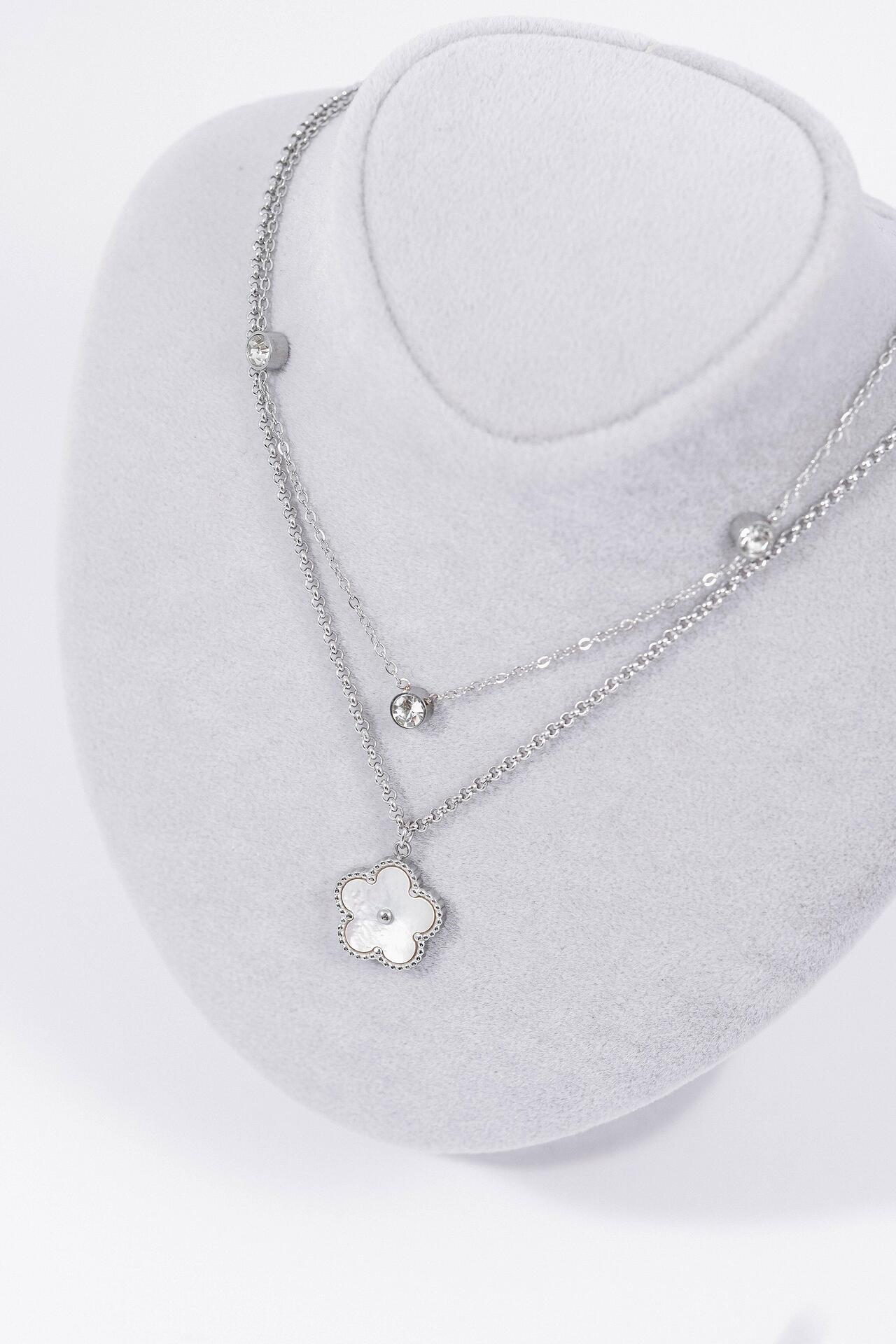 Silver necklace with two rows of clover 