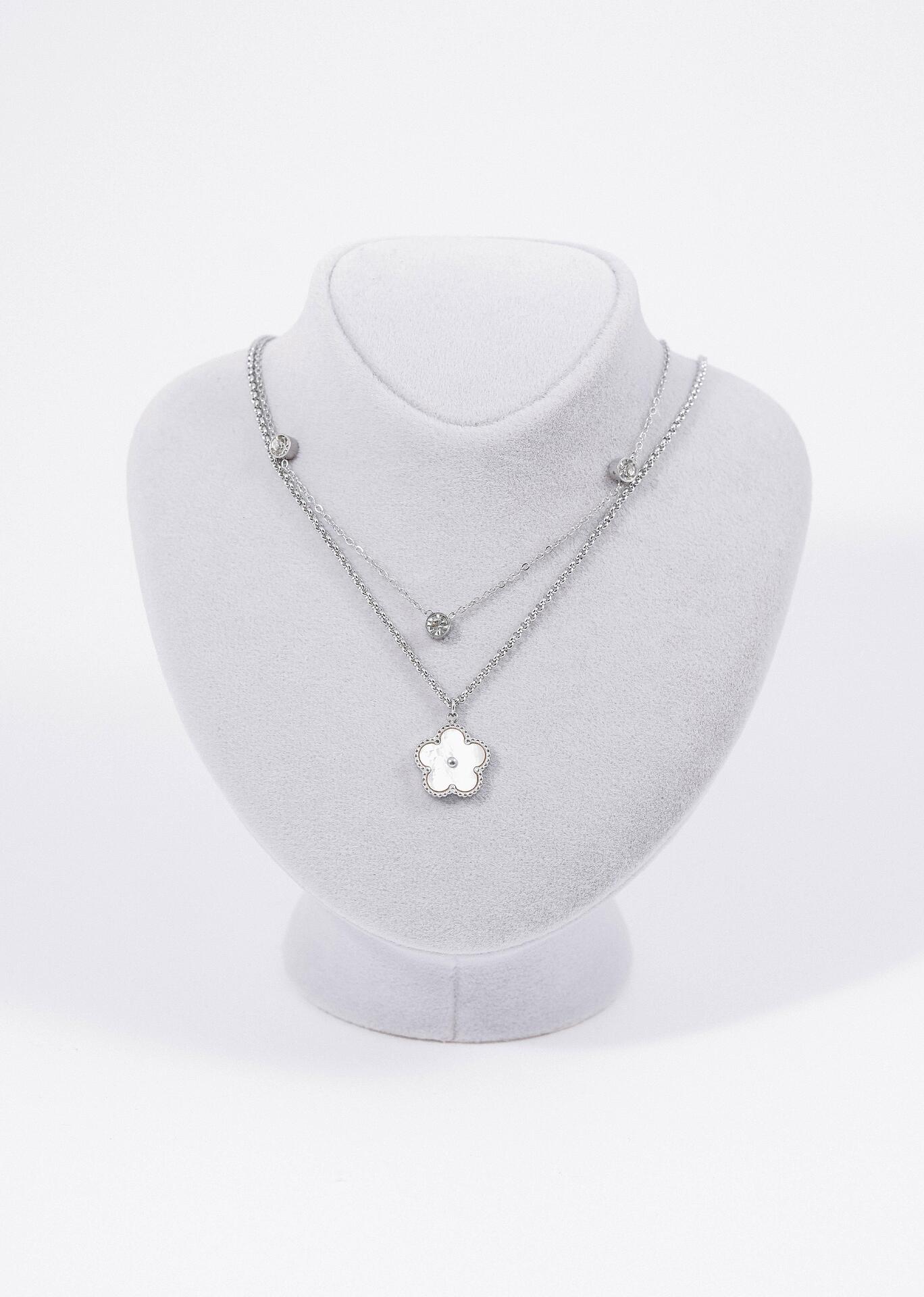 Silver necklace with two rows of clover 