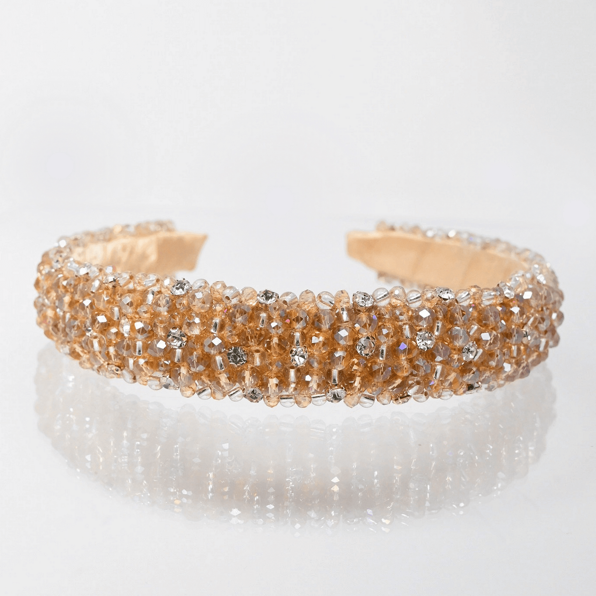 Tiara with beige and silver crystals