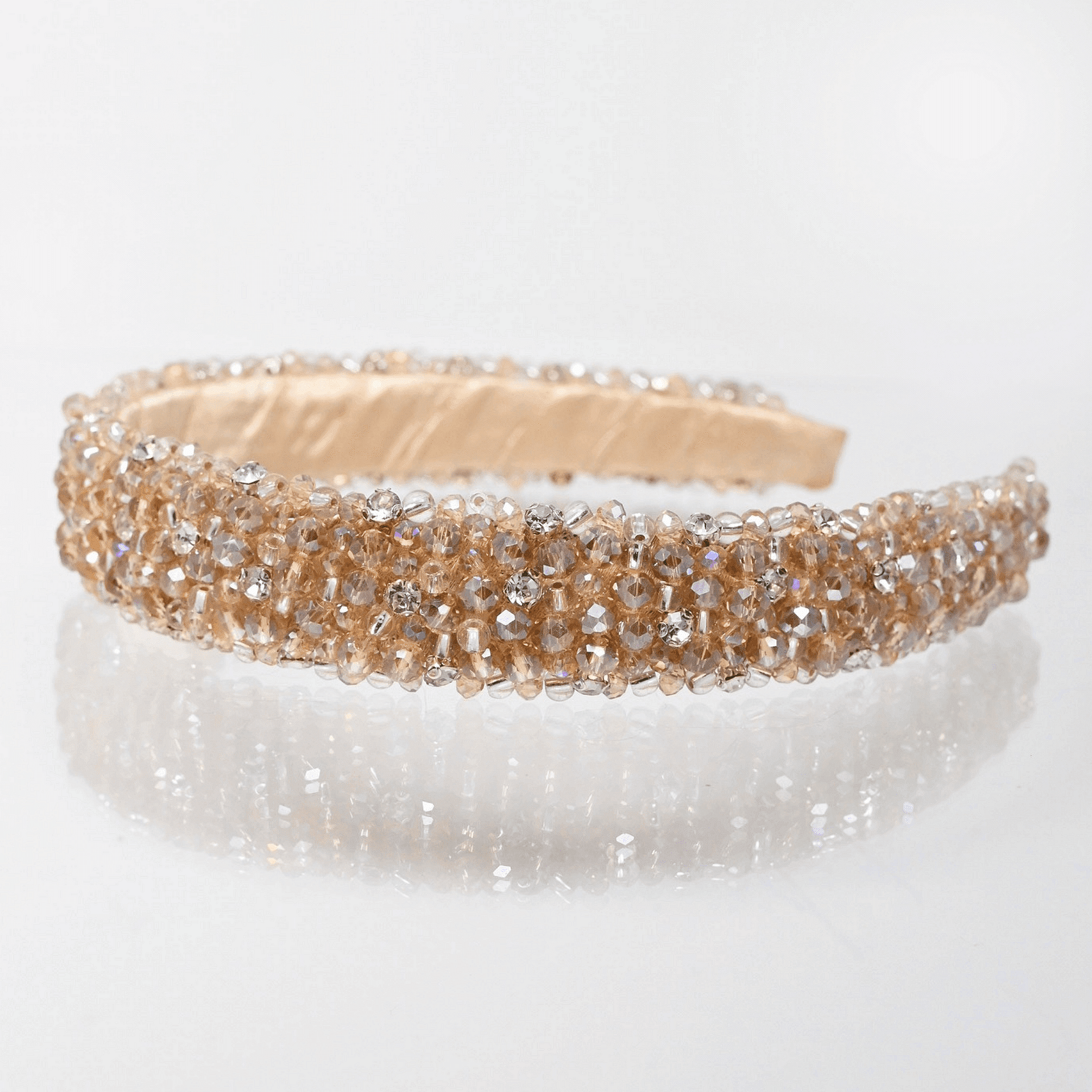 Tiara with beige and silver crystals