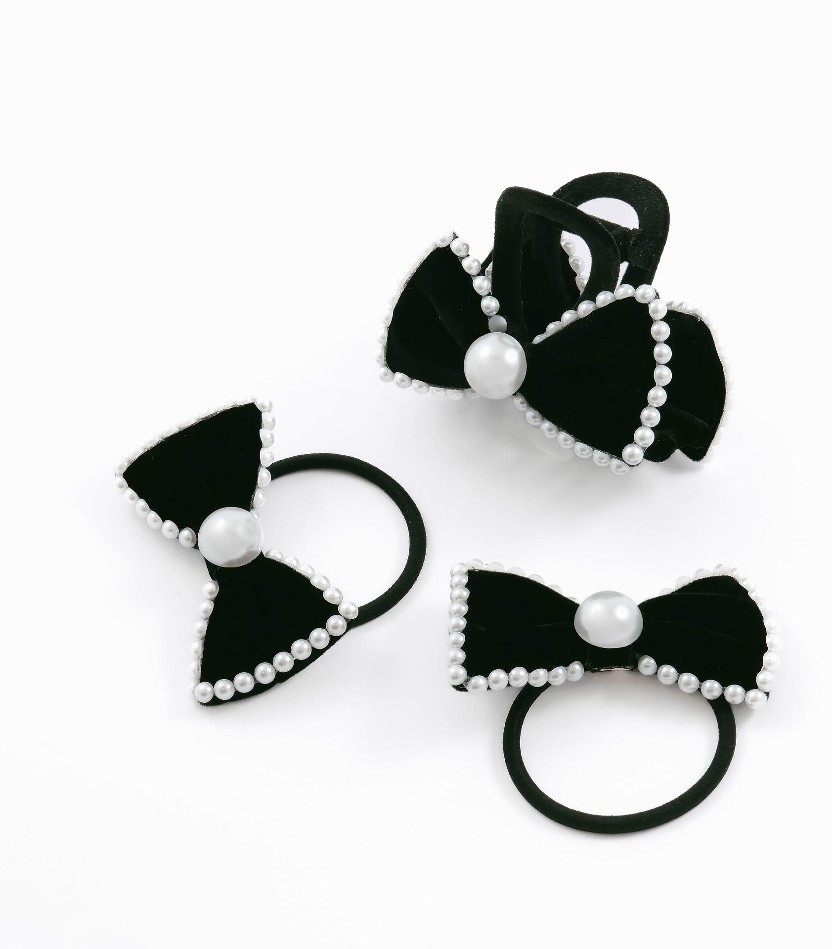 Suede black hair accessories of choice